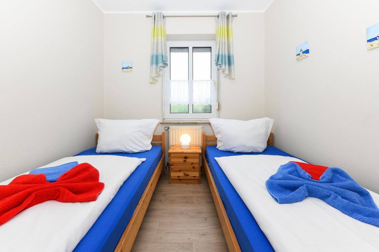 Ferienwohnung Langeoog Inselhaus Am Deich นอยฮาร์ลิงเงอซีล ภายนอก รูปภาพ