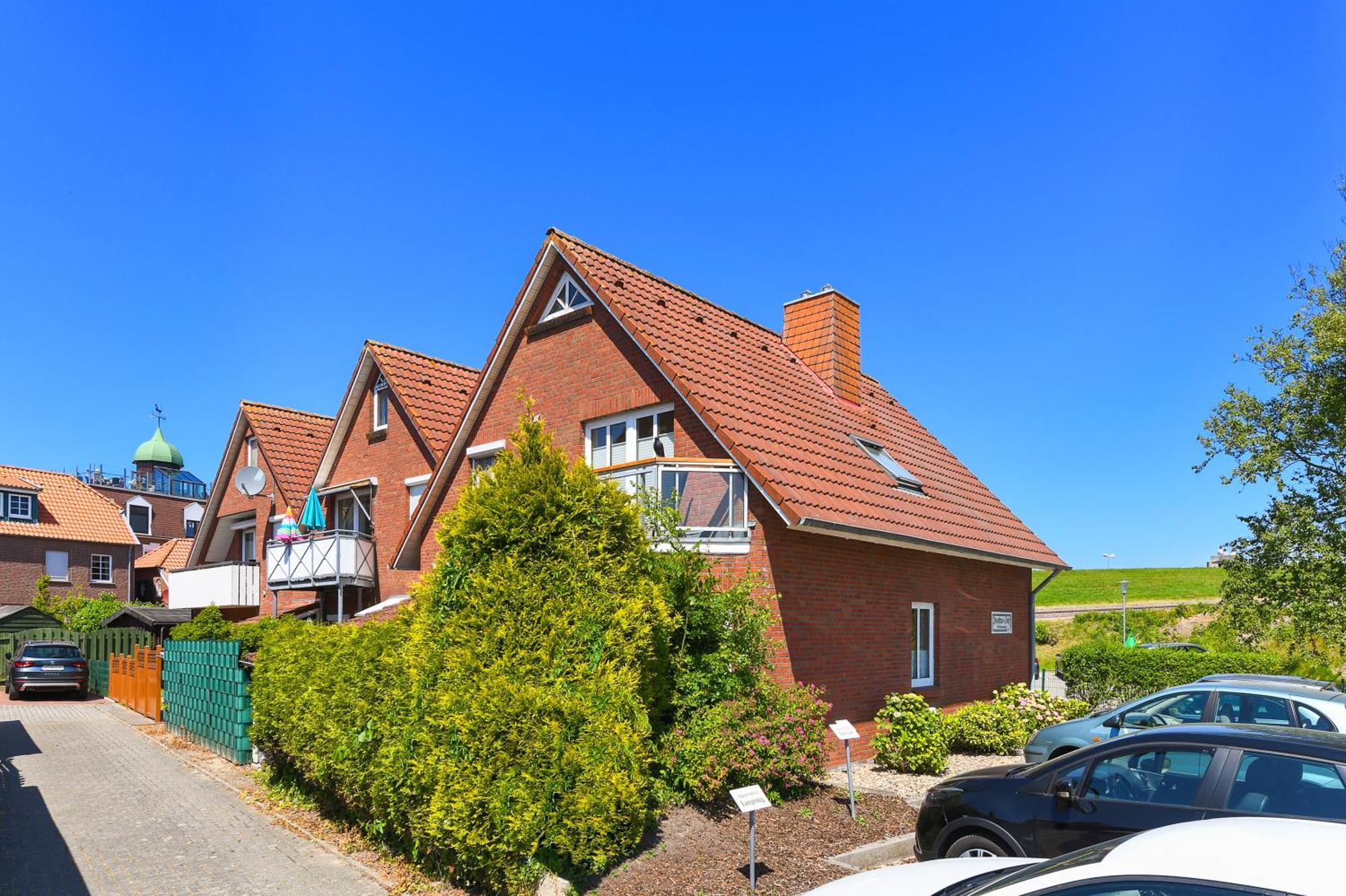 Ferienwohnung Langeoog Inselhaus Am Deich นอยฮาร์ลิงเงอซีล ภายนอก รูปภาพ